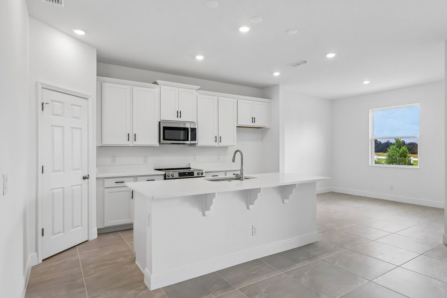 Furnished interior view inside a new home in Trinity Lakes, Groveland (Image 3).