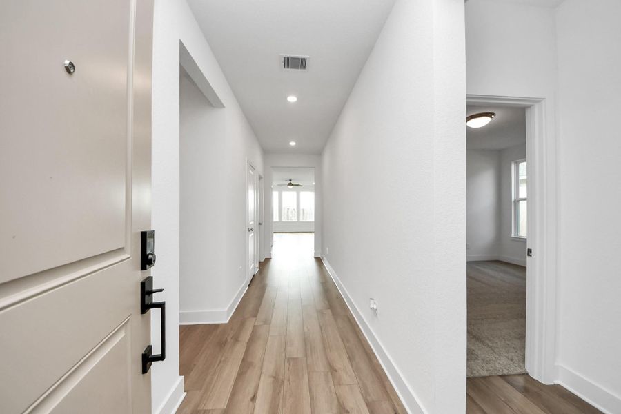 Don't miss the flex space that can be used as a study, etc. Covered patio with fenced backyard for entertaining friends & family. Grass in front & back is included with a sprinkler system. The Canopies is conveniently located between The Woodlands & Valley Ranch in New Caney. Amenities include swimming pool, splash pad, butterfly area, walking trails. Shopping & Entertainment in the Woodlands or Valley Ranch & 32 Miles from Houston. Easy Access to I45, I59/69, TX 242, FM 1314, and FM 1485.