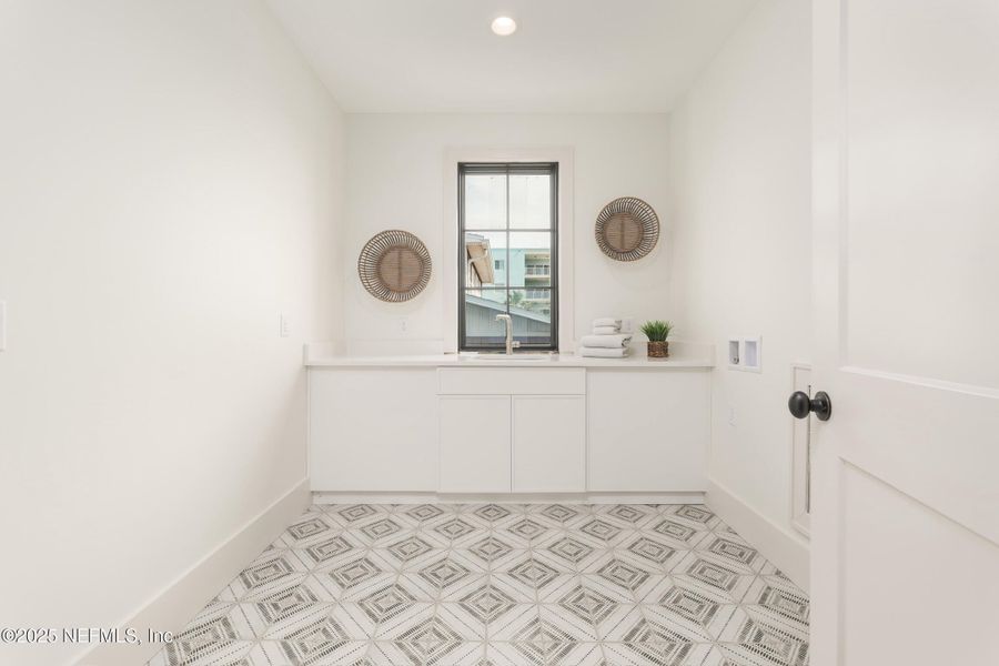 Furnished interior in a model home at Townhomes on 1st in Jacksonville Beach (Image 9).