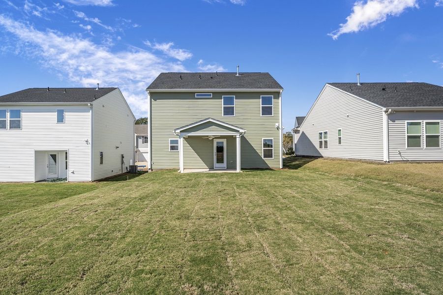 Exterior details and patio area of a home in Mayfair Village, Spartanburg (Image 18).