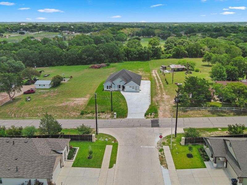 Front exterior of a new home in , Brenham, TX, highlighting curb appeal (Image 18). Front exterior of a new home in , Brenham, TX, highlighting curb appeal (Image 18).