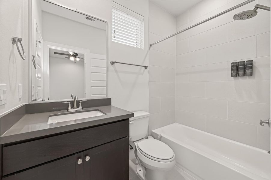 Furnished interior view inside a new home in The Corner At Buffalo Pointe, Houston (Image 16).