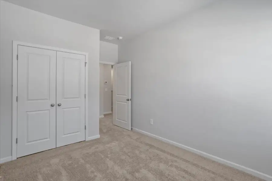 Spacious, unfurnished interior of a new home in West Main Townhomes, Sanford (Image 22).
