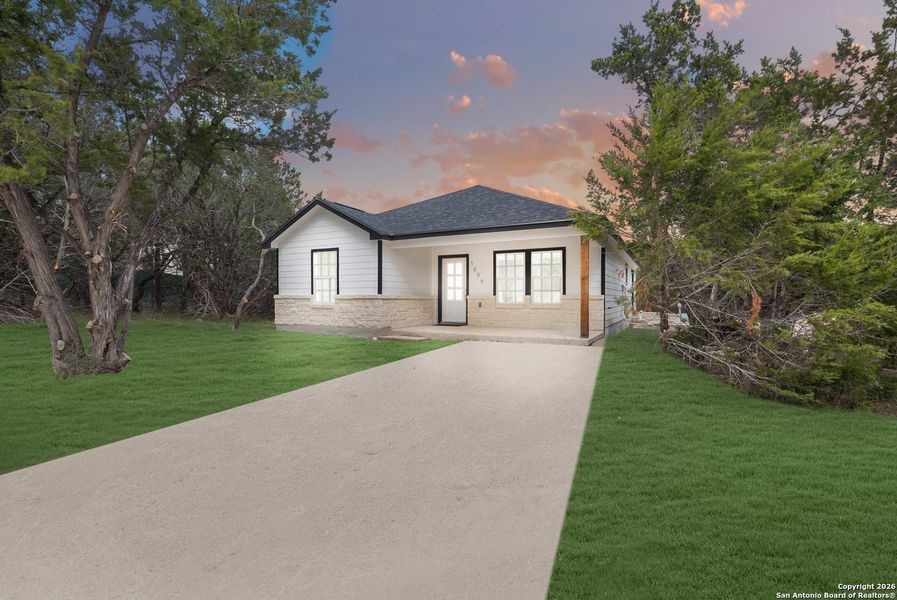 Front exterior of a new home in , Spring Branch, TX, highlighting curb appeal (Image 26).