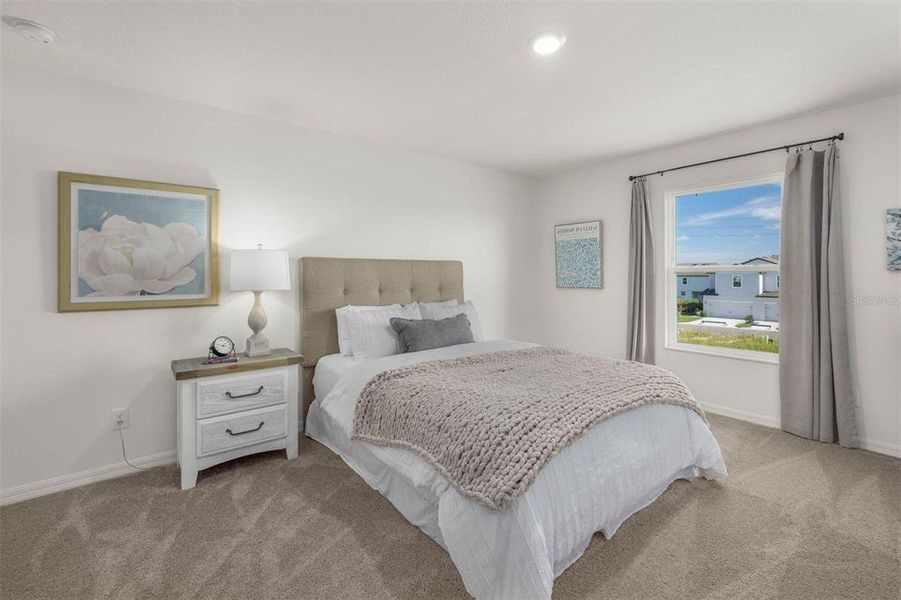 Furnished interior view inside a new home in Sol Vista, Dundee (Image 12).