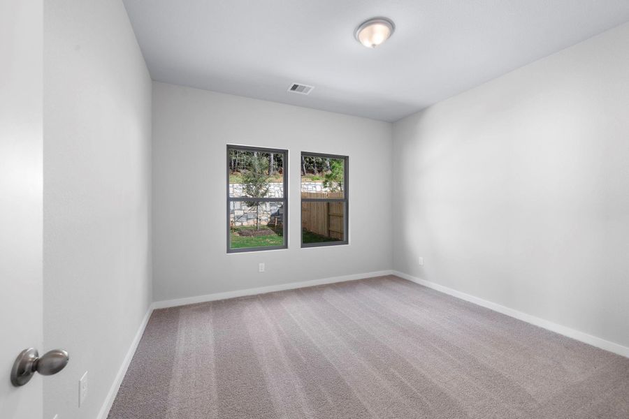 Spacious, unfurnished interior of a new home in Westridge Cove, Conroe (Image 17).