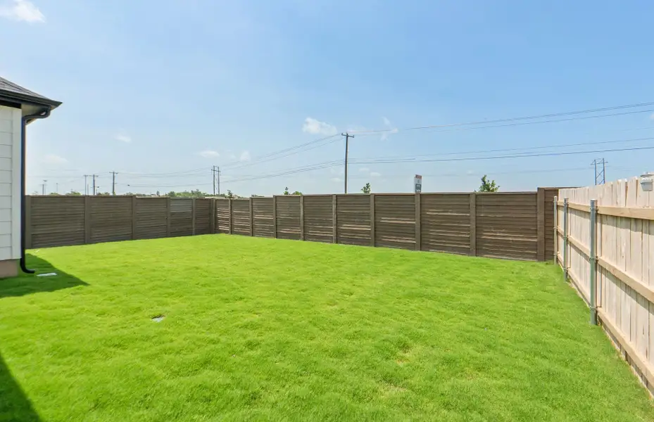Exterior details and patio area of a home in Kuempel Farms, Pflugerville (Image 4).