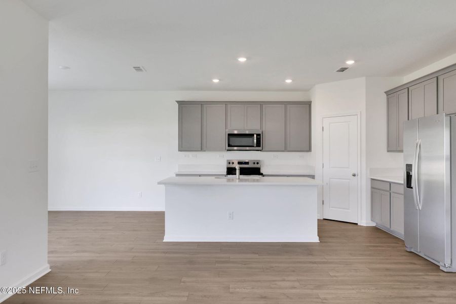 Furnished interior view inside a new home in Amberly, Green Cove Springs (Image 6).