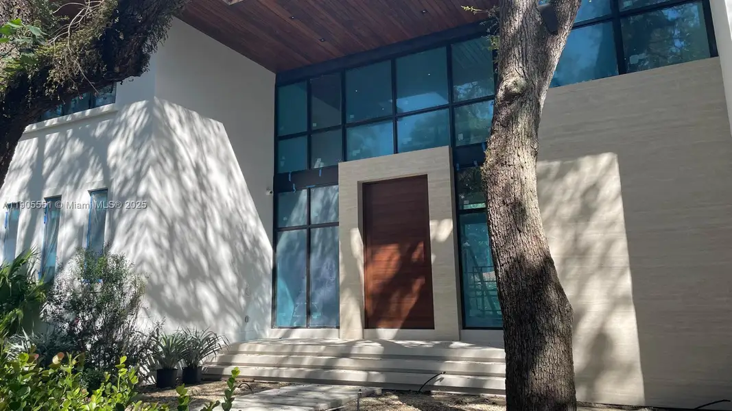 Exterior details and patio area of a home in , Coral Gables (Image 3). Exterior details and patio area of a home in , Coral Gables (Image 3).