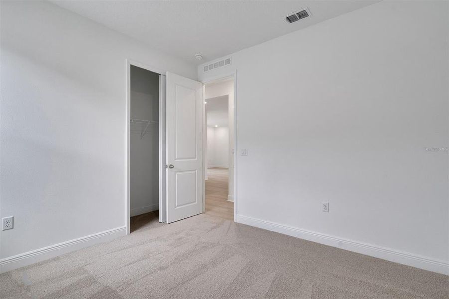 Spacious, unfurnished interior of a new home in Reserve at Hammock Oaks, Lady Lake (Image 32). Spacious, unfurnished interior of a new home in Reserve at Hammock Oaks, Lady Lake (Image 32).