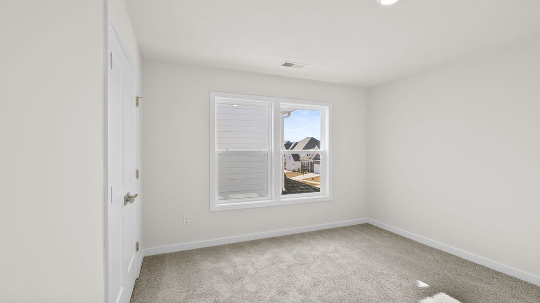 Spacious, unfurnished interior of a new home in Hemlock, Williamston (Image 30).