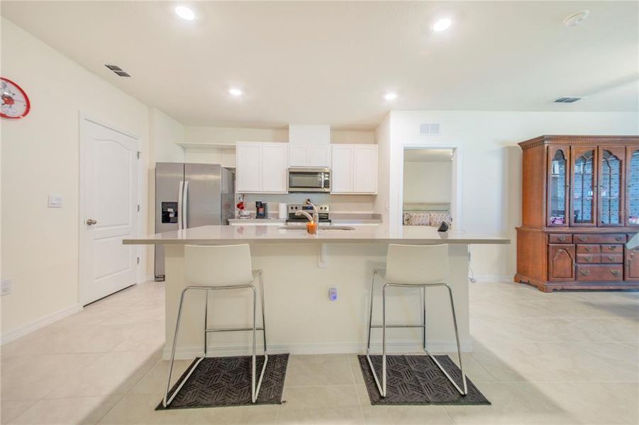 Furnished interior view inside a new home in Bradbury Creek, Haines City (Image 9).