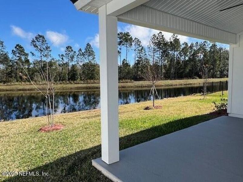 Exterior details and patio area of a home in Sawmill Branch, Palm Coast (Image 2).