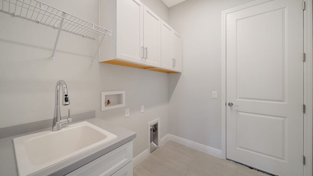 Furnished interior view inside a new home in Wildleaf at North River Ranch, Parrish (Image 11).