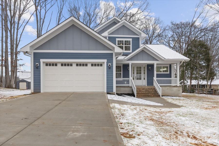 Front exterior of a new home in , Mooresville, NC, highlighting curb appeal (Image 24).