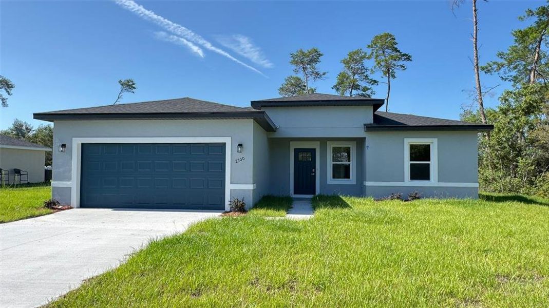 Front exterior of a new home in , Ocala, FL, highlighting curb appeal (Image 9).