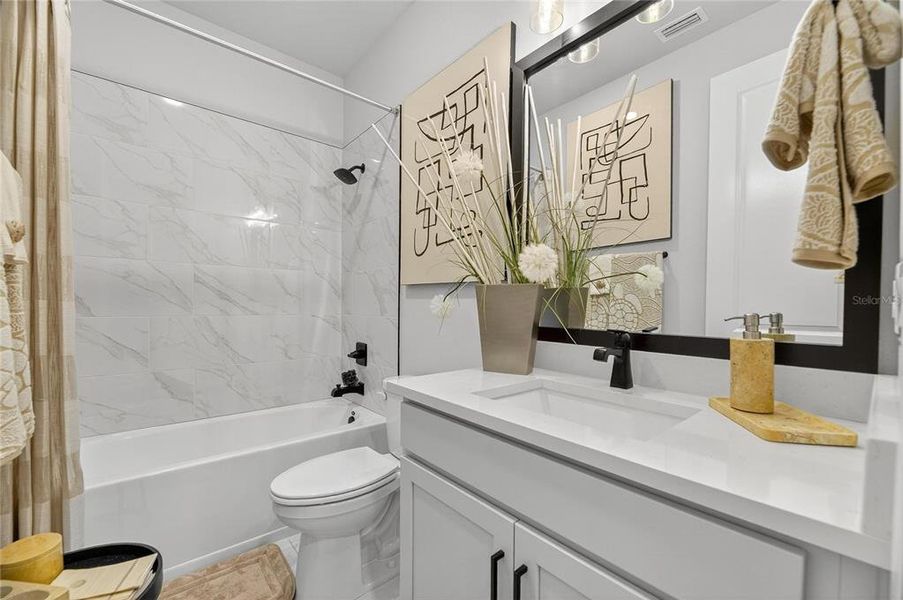 Furnished interior view inside a new home in The Peninsula at Rhodine Lake, Riverview (Image 7).