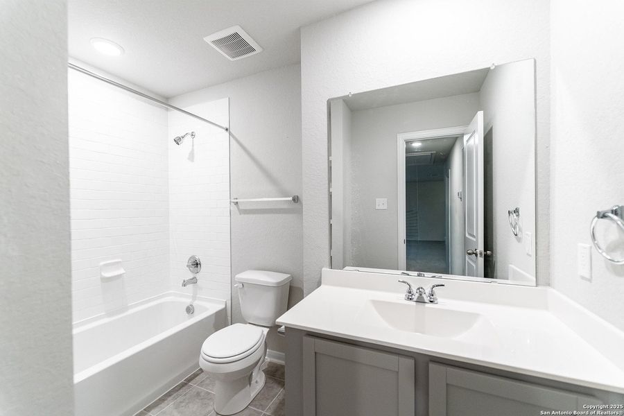 Furnished interior view inside a new home in Hennersby Hollow, San Antonio (Image 5).