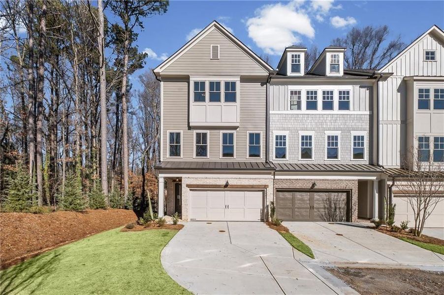 Front exterior of a new home in Devin's Shire - A Kennesaw Tradition, Kennesaw, GA, highlighting curb appeal (Image 2). Front exterior of a new home in Devin's Shire - A Kennesaw Tradition, Kennesaw, GA, highlighting curb appeal (Image 2).