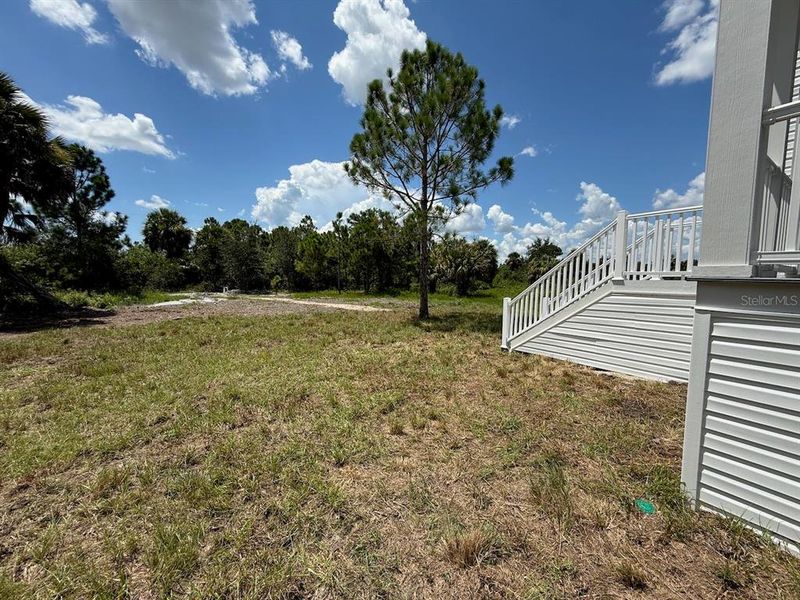Front exterior of a new home in , Punta Gorda, FL, highlighting curb appeal (Image 24). Front exterior of a new home in , Punta Gorda, FL, highlighting curb appeal (Image 24).
