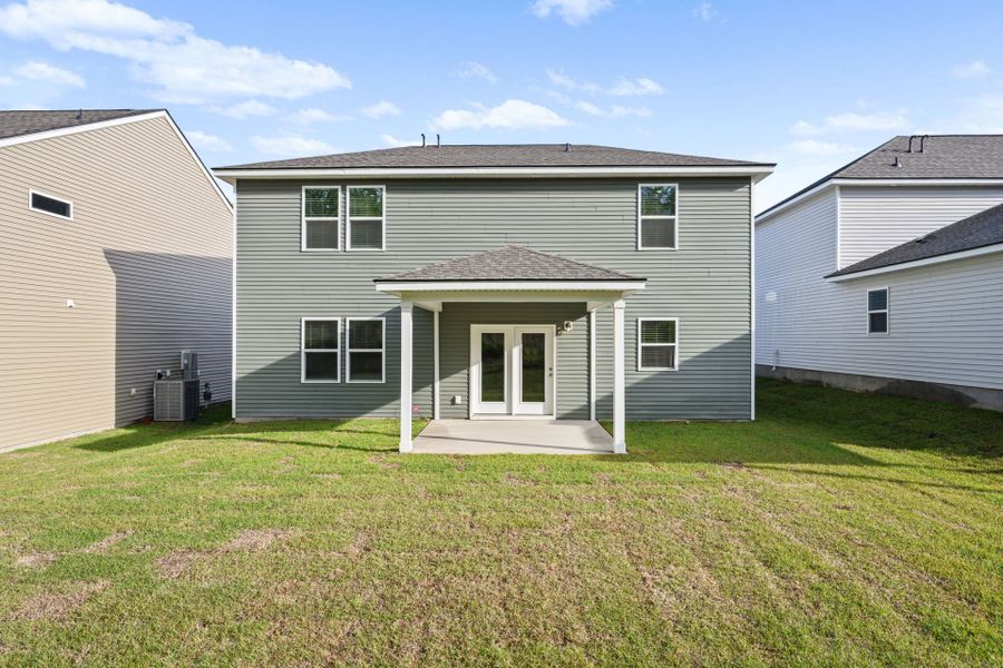 Exterior details and patio area of a home in Grand Arbor, Blythewood (Image 4).
