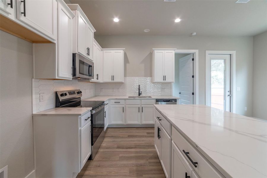 Kitchen island and quartz countertops