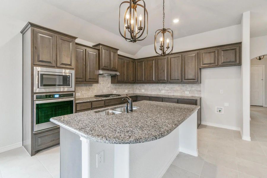 Kitchen | Concept 1841 at Coyote Crossing in Godley, TX by Landsea Homes