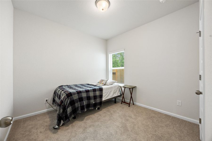 Furnished interior view inside a new home in Mill Creek Trails, Magnolia (Image 8).