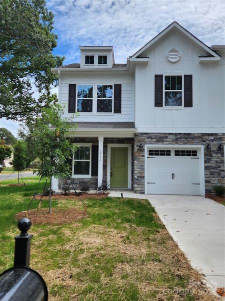 Front exterior of a new home in , Charlotte, NC, highlighting curb appeal (Image 4).