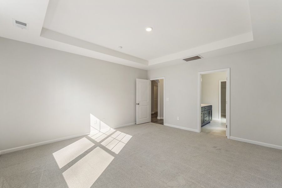 Spacious, unfurnished interior of a new home in Landing at Pine Lake, Anderson (Image 25).