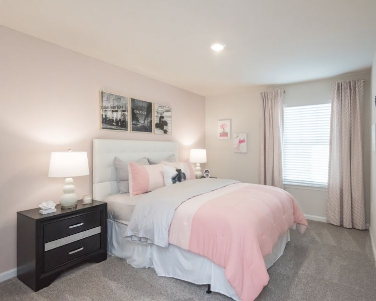 The Lancaster model features three secondary bedrooms.