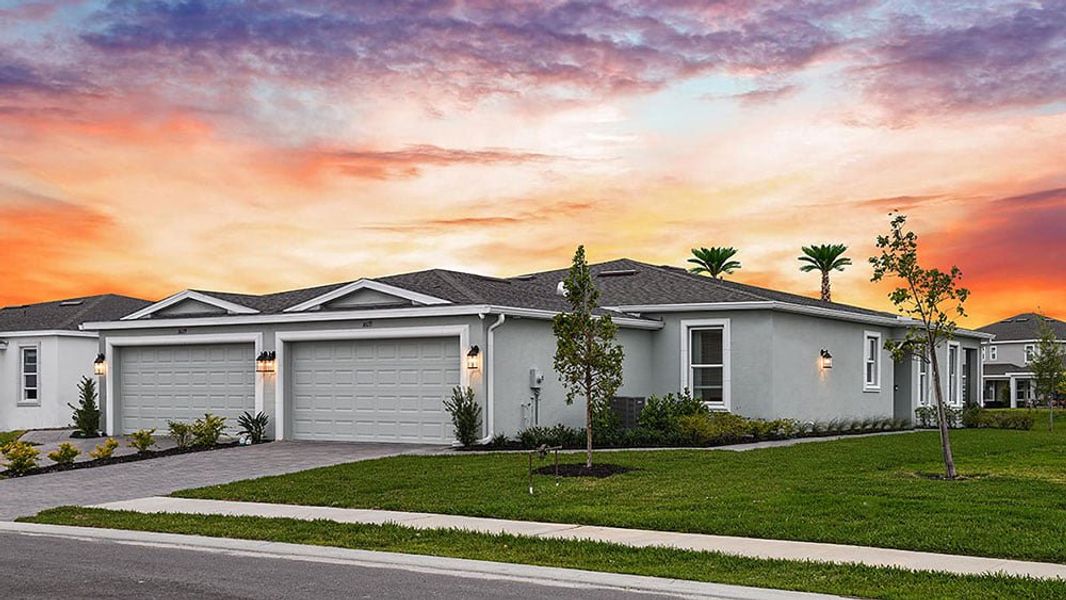 Representative exterior photo of a completed home built from the Caicos by Taylor Morrison in The Cove at West Port, Port Charlotte, FL (Image 1). Representative exterior photo of a completed home built from the Caicos by Taylor Morrison in The Cove at West Port, Port Charlotte, FL (Image 1).