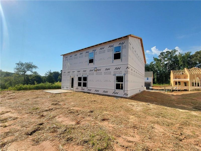 Front exterior of a new home in The Estates at Casteel, Bethlehem, GA, highlighting curb appeal (Image 14).