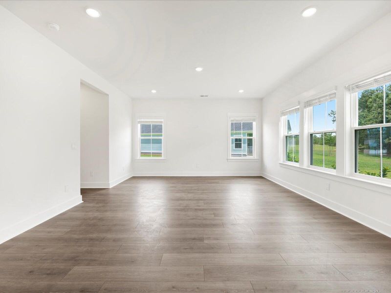 Spacious, unfurnished interior of a new home in The Coves at Lakes of Cane Bay, Summerville (Image 35).