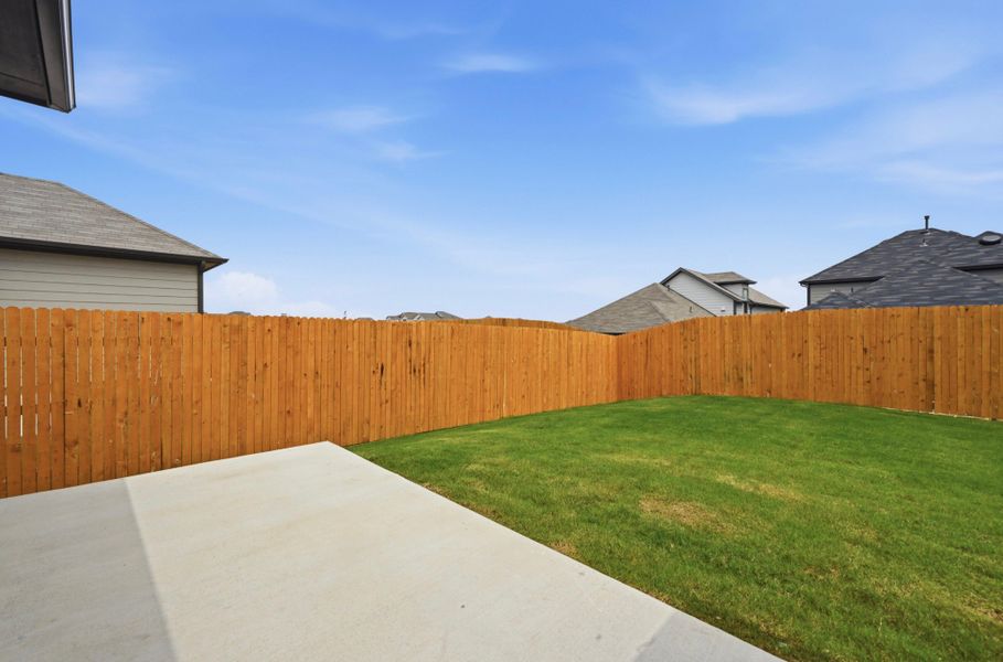 Exterior details and patio area of a home in Trinity Ranch, Elgin (Image 4).