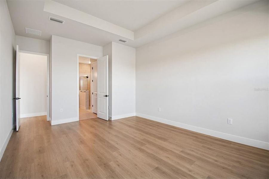 Spacious, unfurnished interior of a new home in Emerald Landing at Waterside at Lakewood Ranch – Lake Series, Sarasota (Image 20).