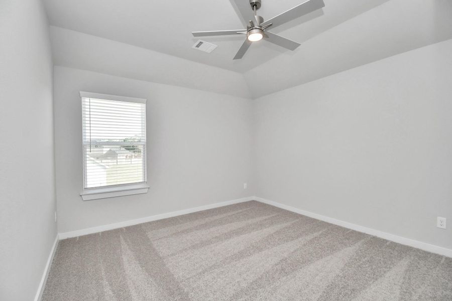 Secondary bedroom features plush carpeting, large windows that let in plenty of natural light, bright paint, and spacious closets. Secondary bedroom features plush carpeting, large windows that let in plenty of natural light, bright paint, and spacious closets.