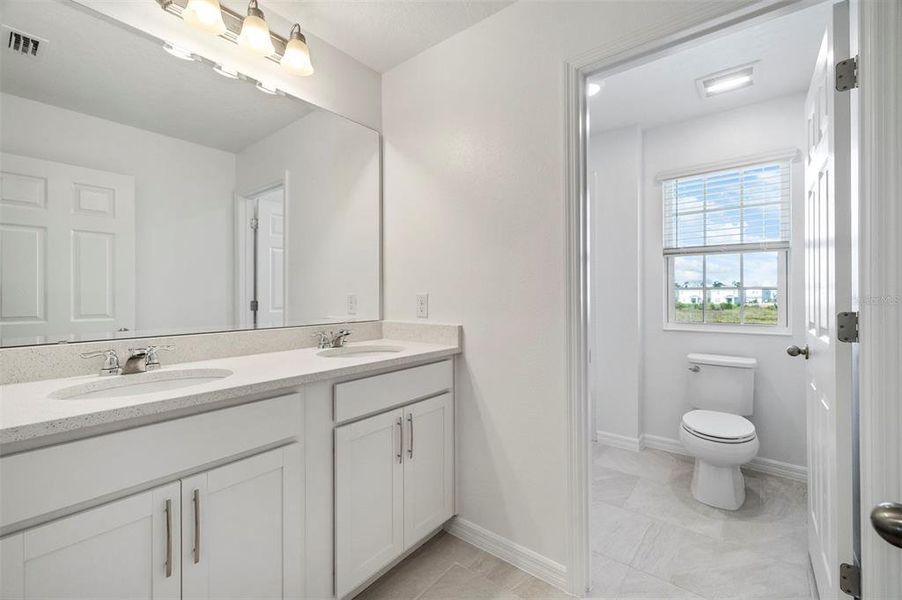 Furnished interior view inside a new home in Preservation Pointe, Davenport (Image 6).