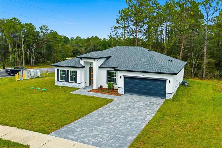 Front exterior of a new home in , Ocala, FL, highlighting curb appeal (Image 2).