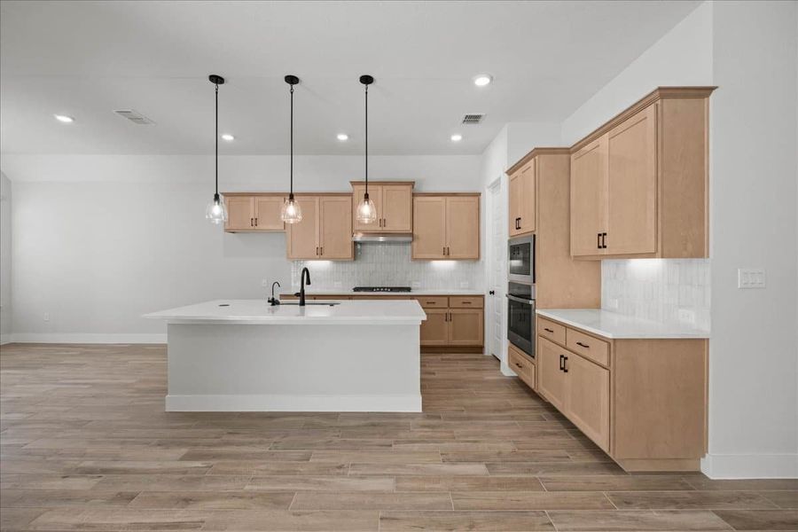 Furnished interior view inside a new home in 6 Creeks, Kyle (Image 7). Furnished interior view inside a new home in 6 Creeks, Kyle (Image 7).