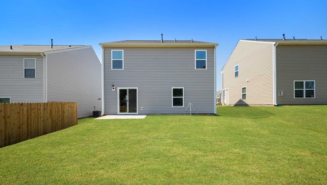 Exterior details and patio area of a home in Paddock Point, Roebuck (Image 2).