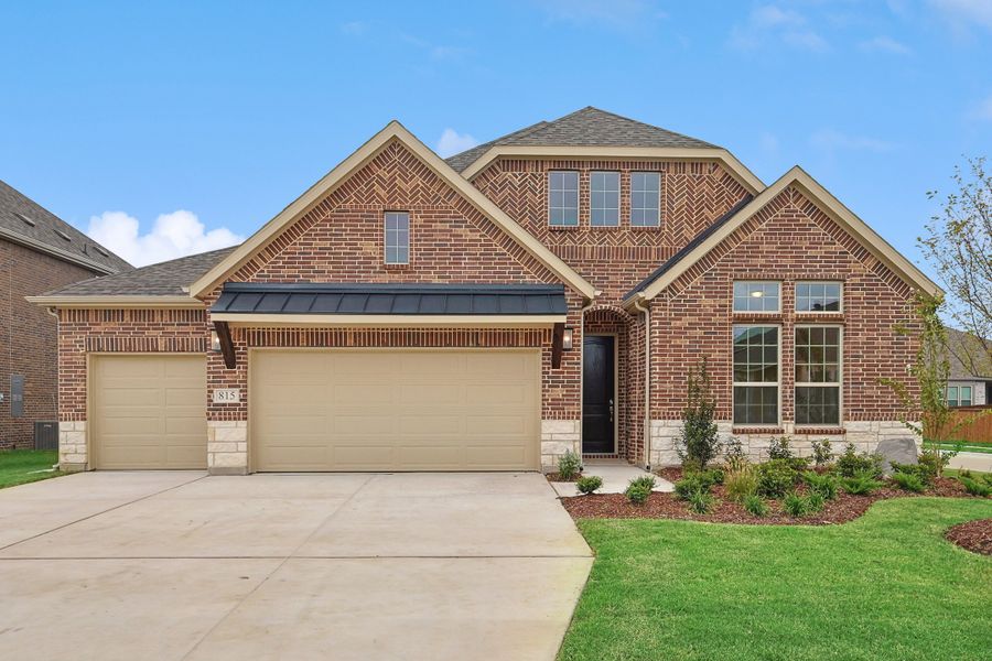 Representative exterior photo of a completed home built from the Classic Series - Vanderbilt by DRB Homes in Oaks at San Gabriel, Georgetown, TX (Image 31).