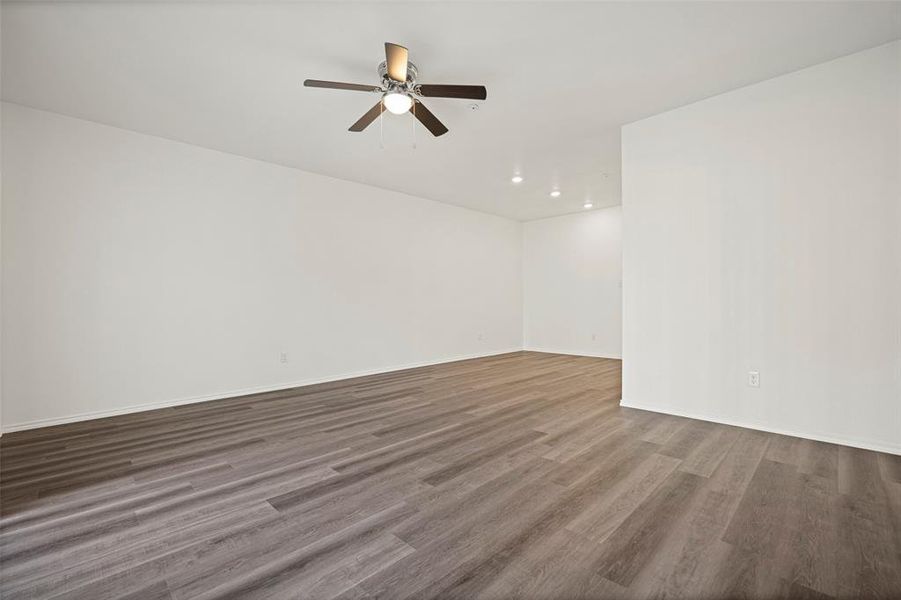 Featuring ceiling fan and hardwood / wood-like floors