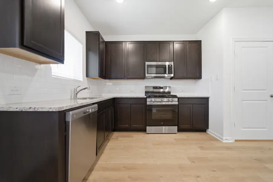 Furnished interior view inside a new home in Westridge, McKinney (Image 6).