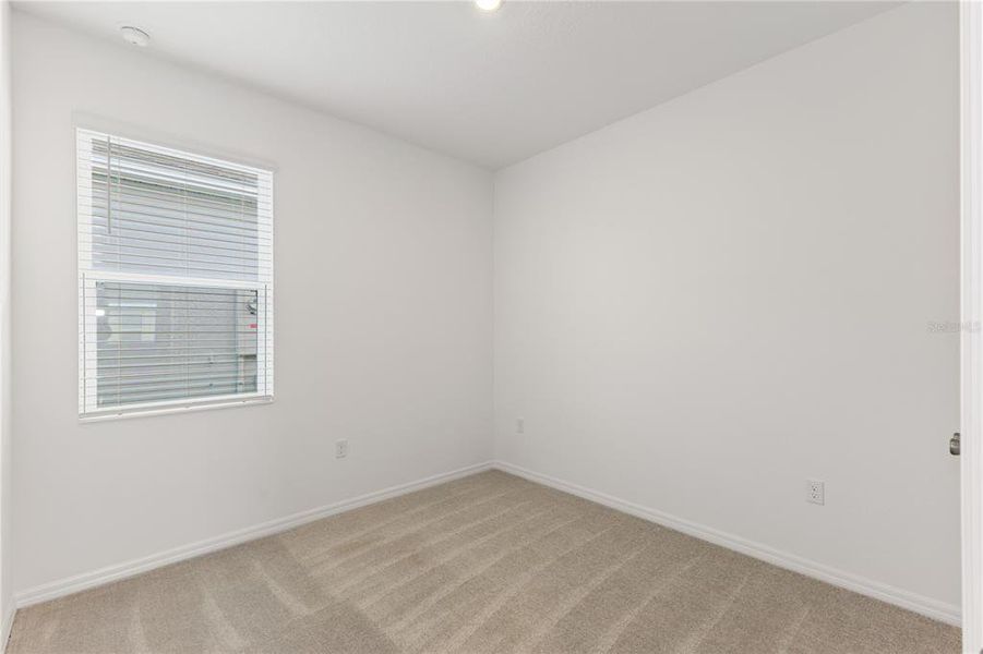 Spacious, unfurnished interior of a new home in Liberty Station, Orange City (Image 10).