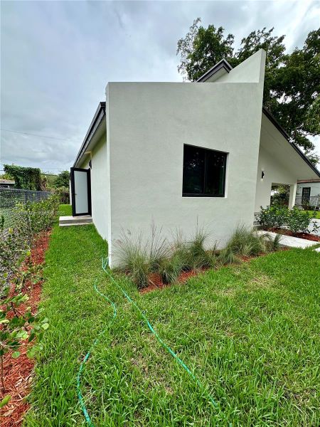 Front exterior of a new home in , Miami, FL, highlighting curb appeal (Image 25).