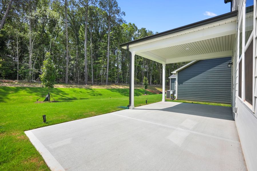 Exterior details and patio area of a home in Michaux Gardens, Belmont (Image 3).