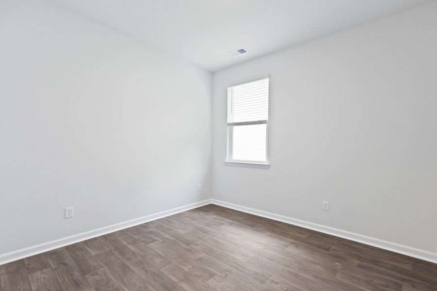 Spacious, unfurnished interior of a new home in Pine Hills at Cane Bay, Summerville (Image 30).