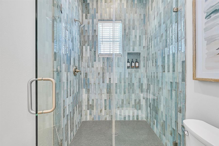 This second floor ensuite walk in shower features striking tile work and modern finishes that instantly stand out. It’s a detail buyers will remember.