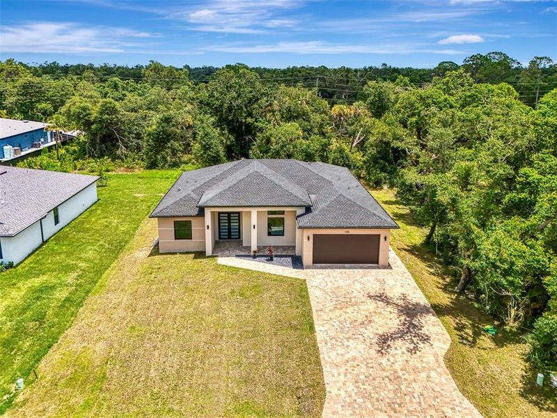 Front exterior of a new home in , Port Charlotte, FL, highlighting curb appeal (Image 30).
